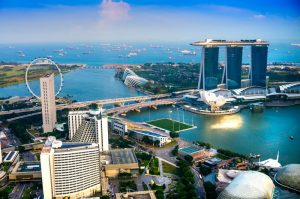 Singapore city skyline at sunset.